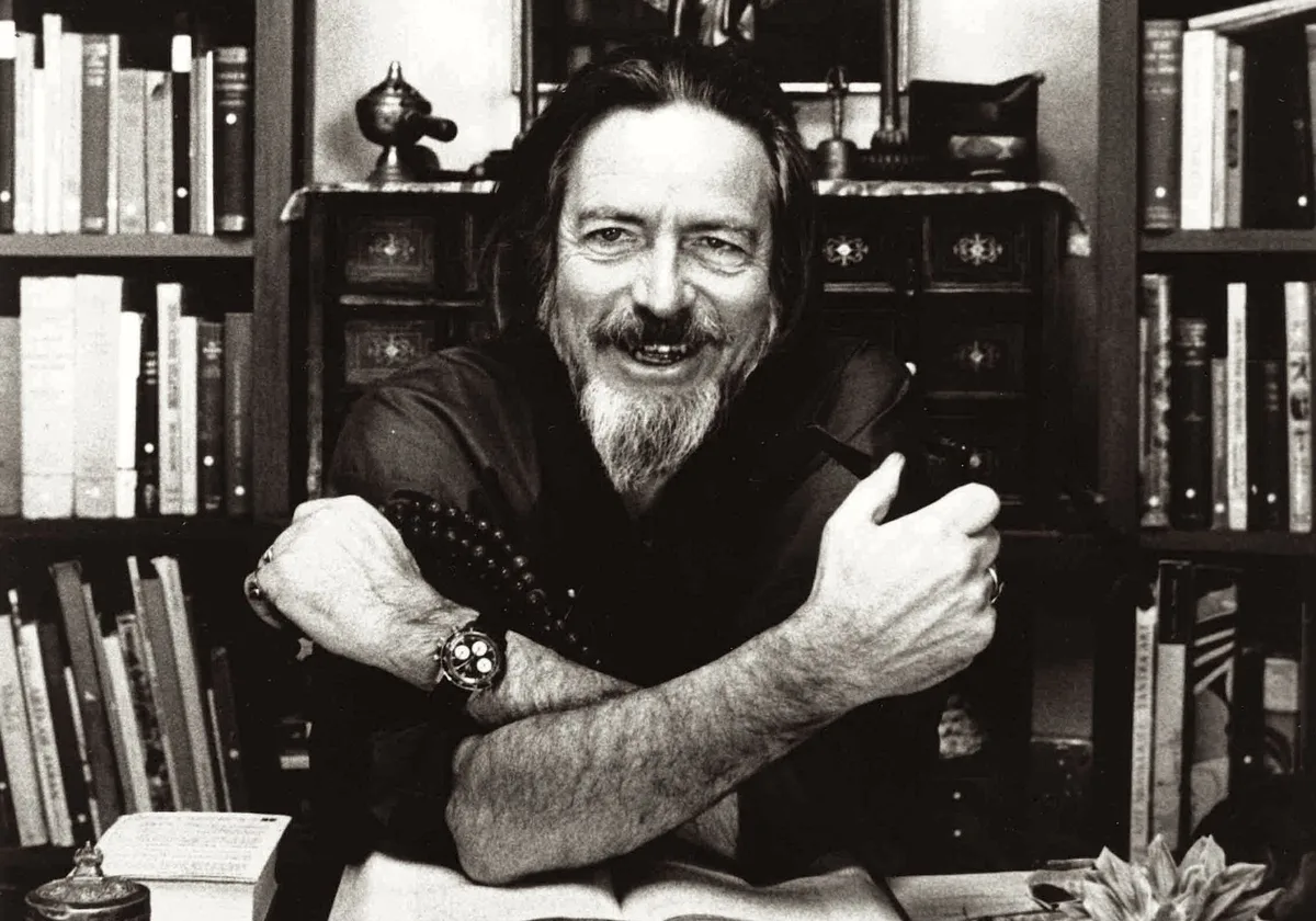 Alan Watts at his desk